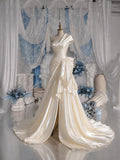 Load image into Gallery viewer, Ivory Asymmetric Wedding Gown with Sculptural Draping, Modern Bridal Dress, Made to Measure