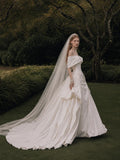 Load image into Gallery viewer, Ivory Statement Wedding Dress with Flowing Skirt and Refined Bridal Silhouette