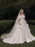 Load image into Gallery viewer, Ivory Statement Wedding Dress with Flowing Skirt and Refined Bridal Silhouette
