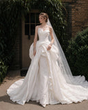 Load image into Gallery viewer, Ivory Wedding Gown with Graceful Full Length Silhouette and Dramatic Bridal Train