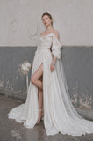 Load image into Gallery viewer, Ivory Statement Wedding Dress with Flowing Skirt and Refined Bridal Silhouette