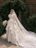 Load image into Gallery viewer, Ivory Wedding Gown with Graceful Full Length Silhouette and Dramatic Bridal Train