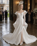 Load image into Gallery viewer, Ivory Statement Wedding Dress with Flowing Skirt and Refined Bridal Silhouette