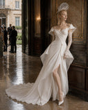 Load image into Gallery viewer, Ivory Statement Wedding Dress with Flowing Skirt and Refined Bridal Silhouette