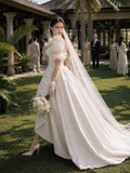Load image into Gallery viewer, Ivory Statement Wedding Dress with Flowing Skirt and Refined Bridal Silhouette