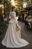 Load image into Gallery viewer, Ivory Statement Wedding Dress with Flowing Skirt and Refined Bridal Silhouette