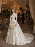 Load image into Gallery viewer, Ivory Statement Wedding Dress with Flowing Skirt and Refined Bridal Silhouette