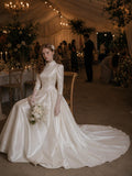 Load image into Gallery viewer, Ivory Statement Wedding Dress with Flowing Skirt and Refined Bridal Silhouette