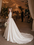Load image into Gallery viewer, Ivory Statement Wedding Dress with Flowing Skirt and Refined Bridal Silhouette