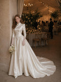 Load image into Gallery viewer, Ivory Statement Wedding Dress with Flowing Skirt and Refined Bridal Silhouette