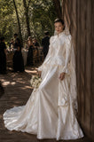 Load image into Gallery viewer, Ivory Statement Wedding Dress with Flowing Skirt and Refined Bridal Silhouette
