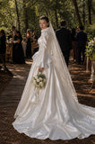 Load image into Gallery viewer, Ivory Statement Wedding Dress with Flowing Skirt and Refined Bridal Silhouette