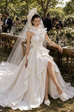 Load image into Gallery viewer, Ivory Statement Wedding Dress with Flowing Skirt and Refined Bridal Silhouette