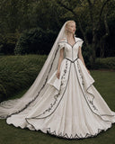 Load image into Gallery viewer, Ivory Wedding Gown with Graceful Full Length Silhouette and Dramatic Bridal Train
