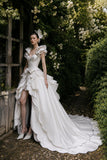 Load image into Gallery viewer, Ivory Statement Wedding Dress with Flowing Skirt and Refined Bridal Silhouette