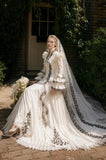 Load image into Gallery viewer, Ivory Statement Wedding Dress with Flowing Skirt and Refined Bridal Silhouette