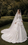 Load image into Gallery viewer, Ivory Statement Wedding Dress with Flowing Skirt and Refined Bridal Silhouette