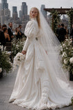Load image into Gallery viewer, Ivory Statement Wedding Dress with Flowing Skirt and Refined Bridal Silhouette