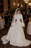Load image into Gallery viewer, Ivory Wedding Gown with Graceful Full Length Silhouette and Dramatic Bridal Train