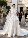 Load image into Gallery viewer, Ivory Statement Wedding Dress with Flowing Skirt and Refined Bridal Silhouette