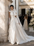 Load image into Gallery viewer, Ivory Statement Wedding Dress with Flowing Skirt and Refined Bridal Silhouette