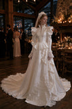 Load image into Gallery viewer, Ivory Wedding Gown with Graceful Full Length Silhouette and Dramatic Bridal Train