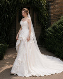 Load image into Gallery viewer, Ivory Wedding Gown with Graceful Full Length Silhouette and Dramatic Bridal Train