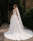 Load image into Gallery viewer, Ivory Wedding Gown with Graceful Full Length Silhouette and Dramatic Bridal Train