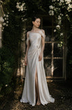 Load image into Gallery viewer, Ivory Statement Wedding Dress with Flowing Skirt and Refined Bridal Silhouette