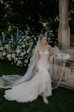 Load image into Gallery viewer, Ivory Wedding Gown with Graceful Full Length Silhouette and Dramatic Bridal Train