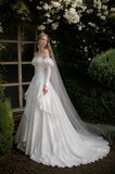 Load image into Gallery viewer, Ivory Wedding Gown with Graceful Full Length Silhouette and Dramatic Bridal Train