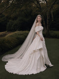 Load image into Gallery viewer, Ivory Statement Wedding Dress with Flowing Skirt and Refined Bridal Silhouette