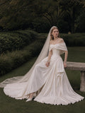 Load image into Gallery viewer, Ivory Statement Wedding Dress with Flowing Skirt and Refined Bridal Silhouette