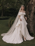 Load image into Gallery viewer, Ivory Statement Wedding Dress with Flowing Skirt and Refined Bridal Silhouette