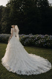 Load image into Gallery viewer, Ivory Wedding Gown with Graceful Full Length Silhouette and Dramatic Bridal Train