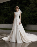 Load image into Gallery viewer, Ivory Statement Wedding Dress with Flowing Skirt and Refined Bridal Silhouette
